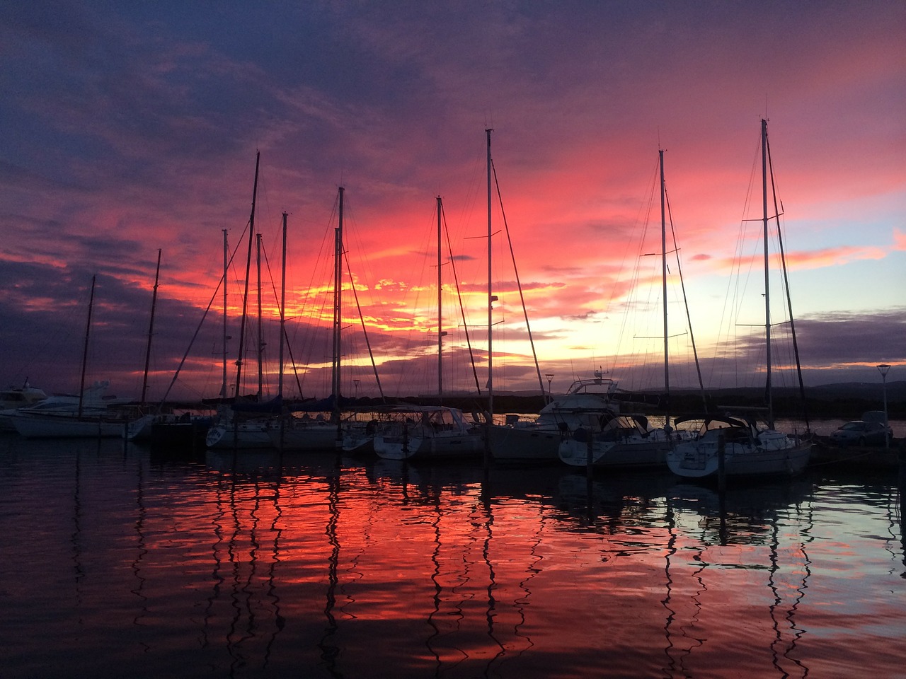 sea boats sunset free photo