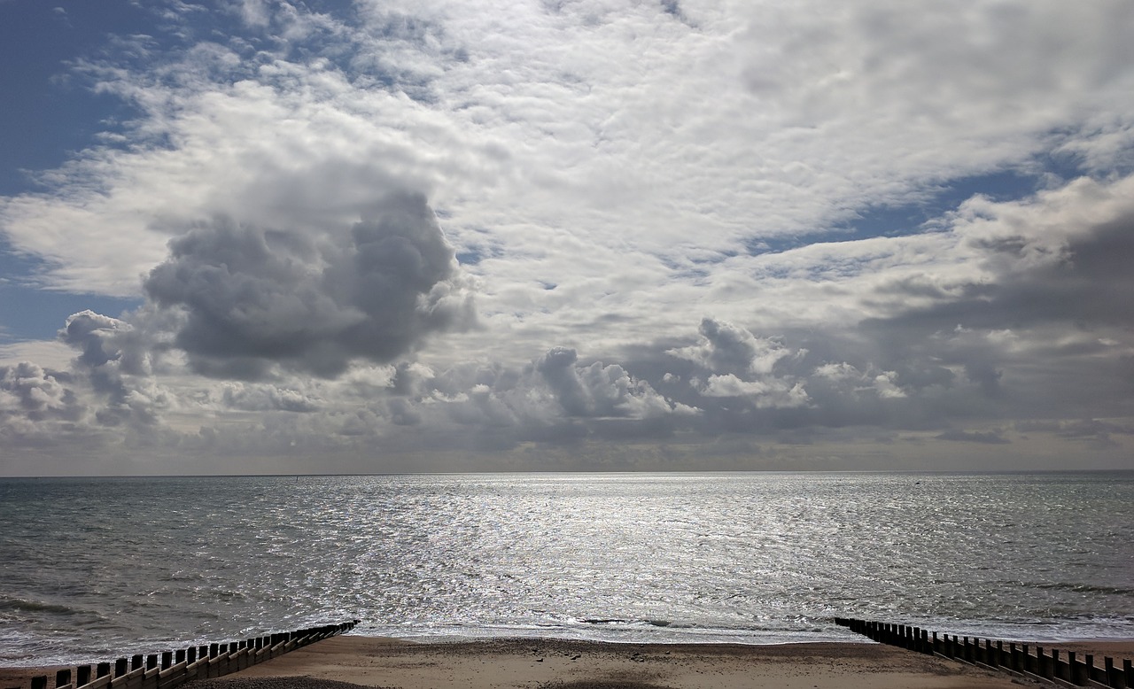 sea beach clouds free photo