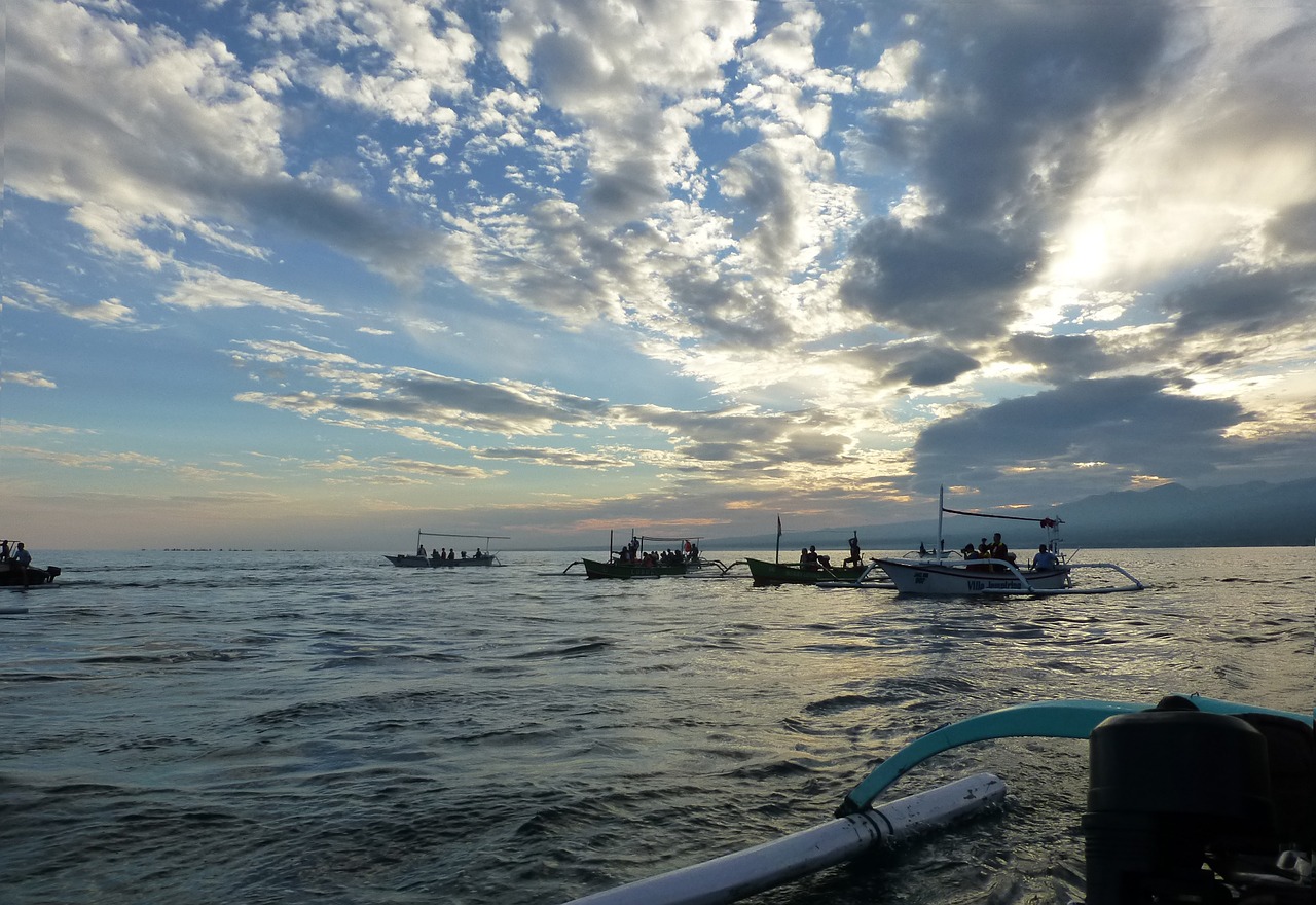 sea fishing boats early in the morning free photo