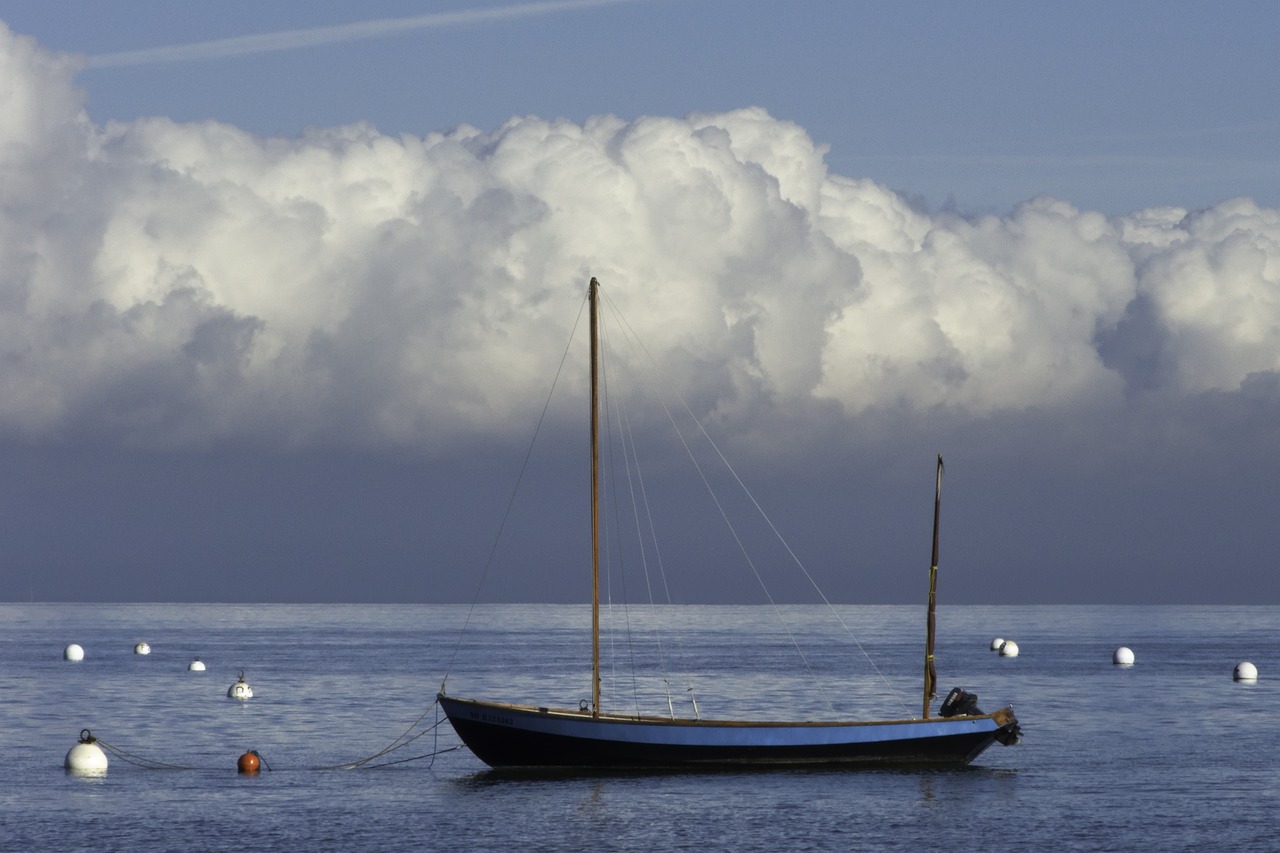 sea boat buoys clouds free photo