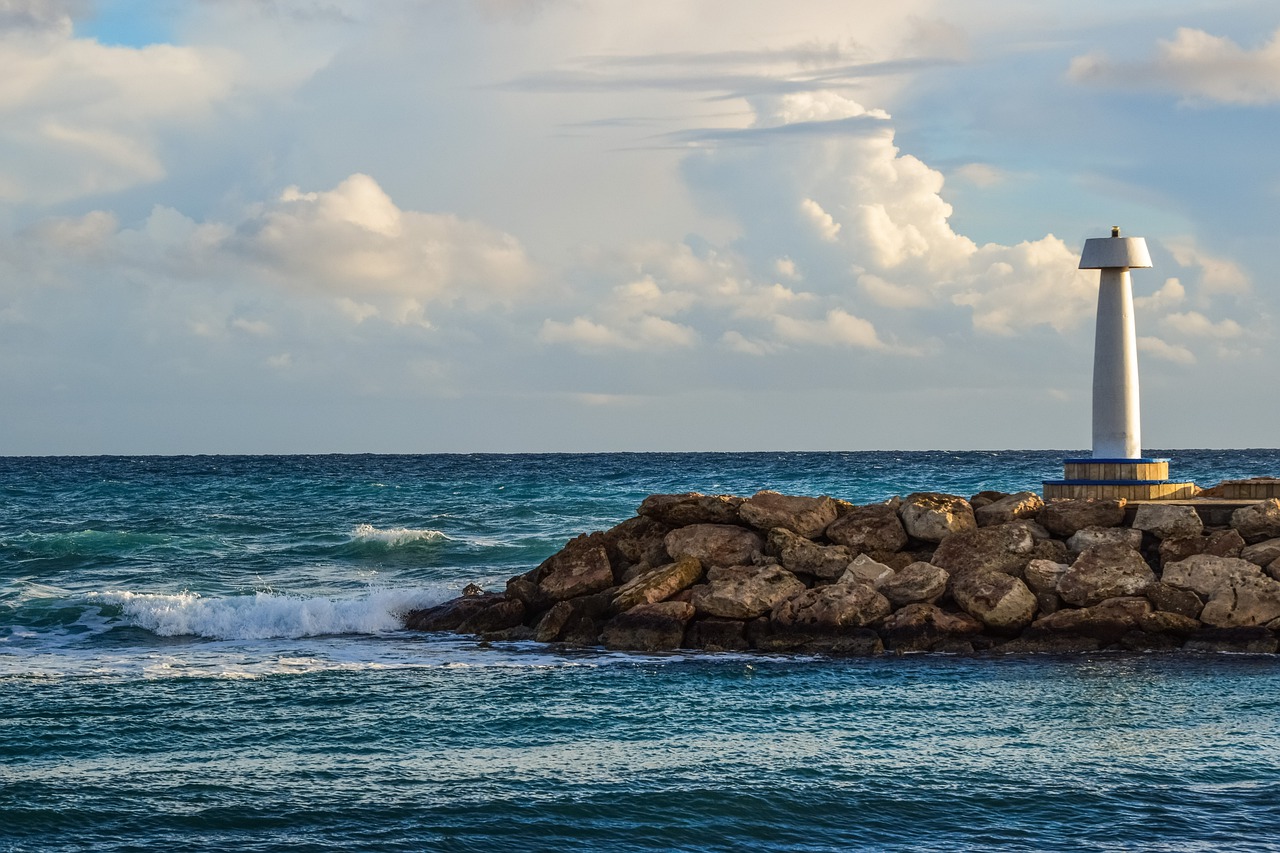 sea breakwater lighthouse free photo