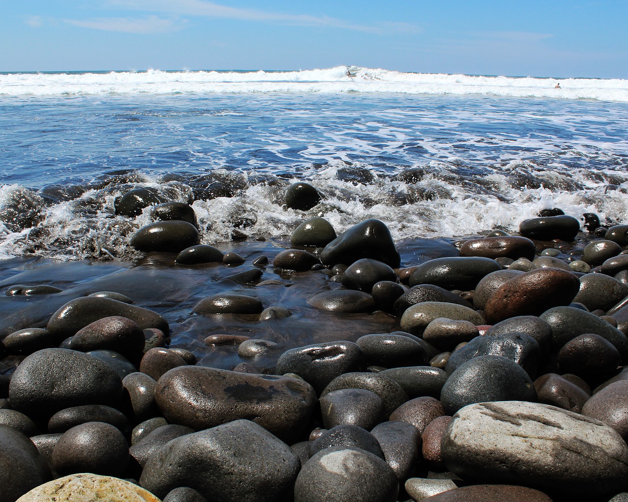 sea body of water rock free photo