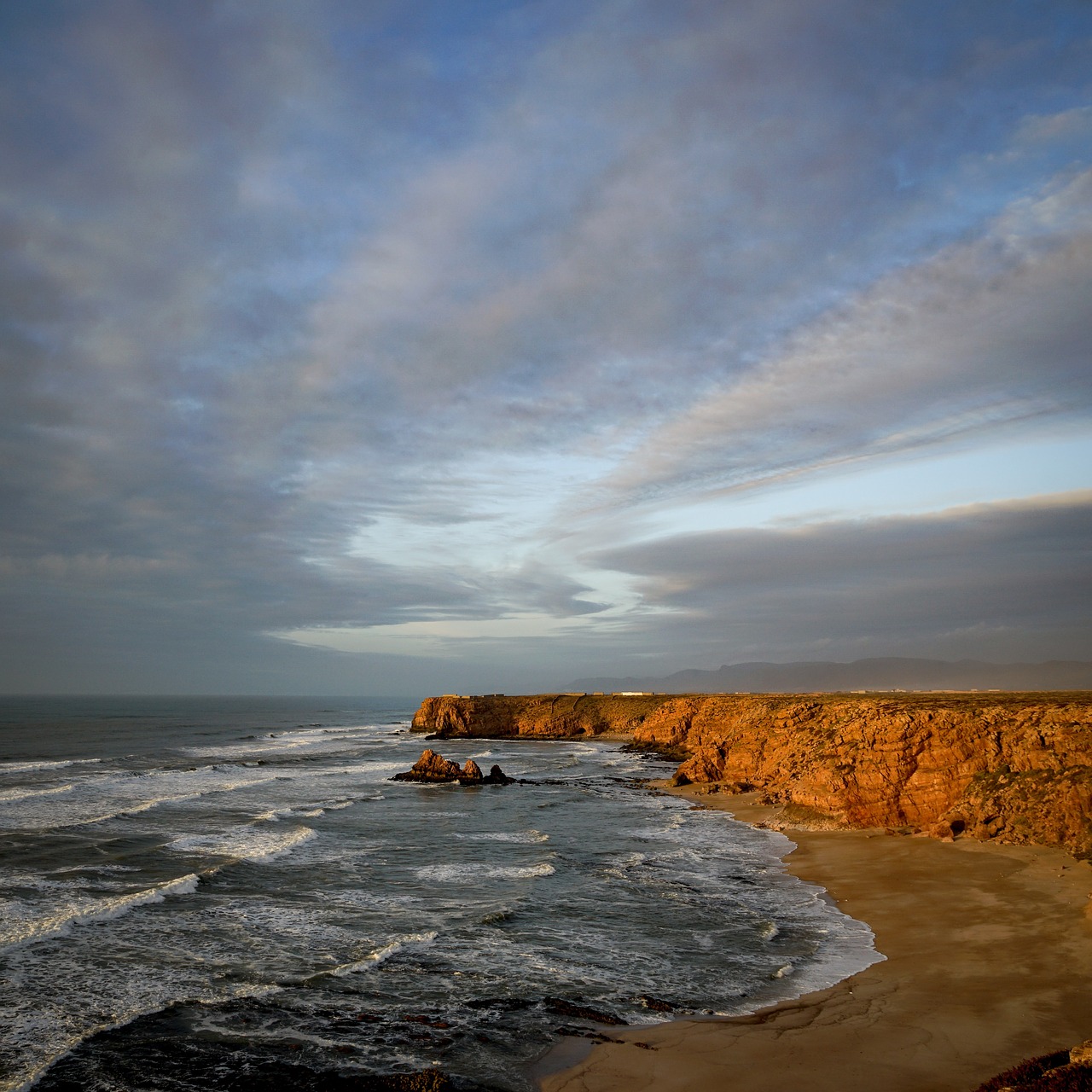 sea  body of water  sunset free photo