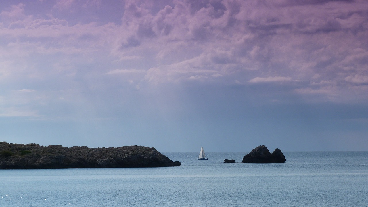 sea sailing boat clouds free photo