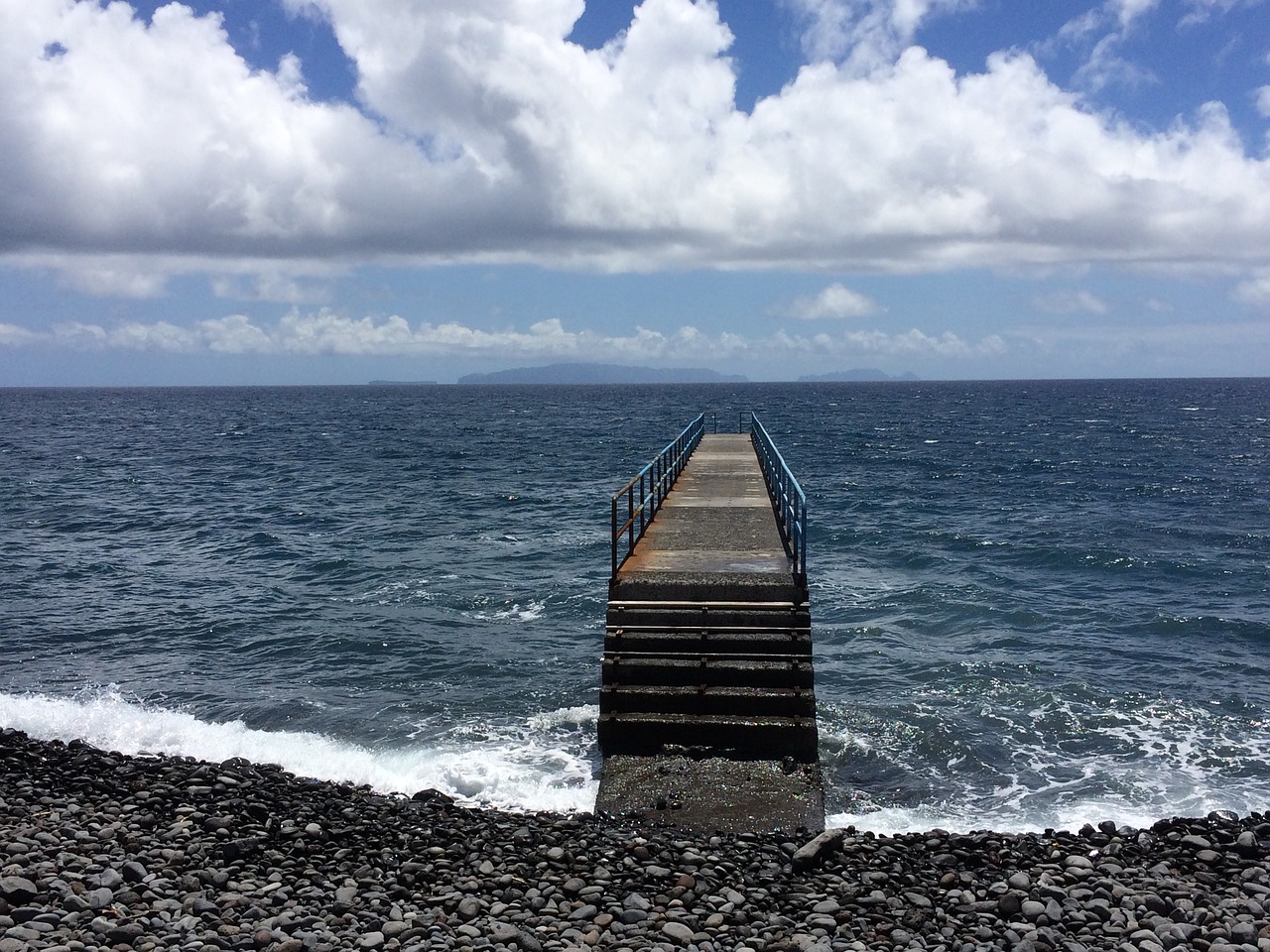 sea  bridge  clouds free photo