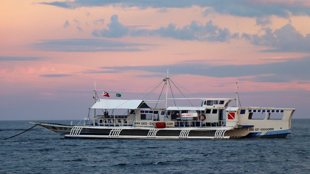 sea  sunset  boat free photo