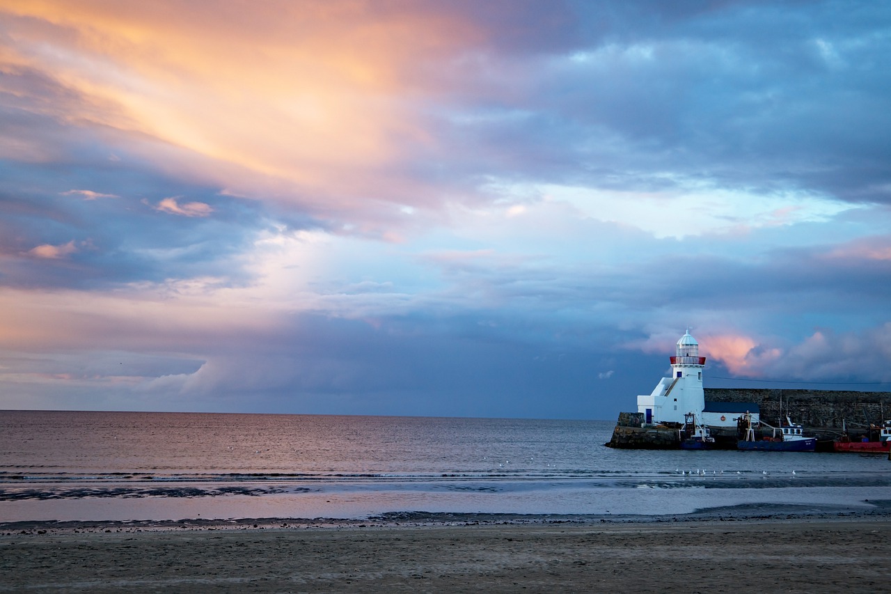 sea  coast  the beach of the lighthouse free photo