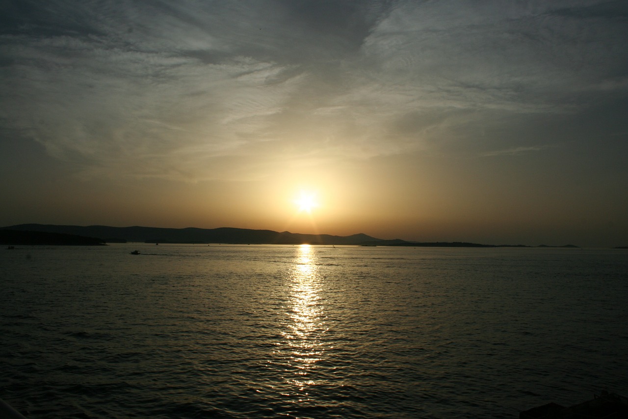 sea sunset waterfront free photo