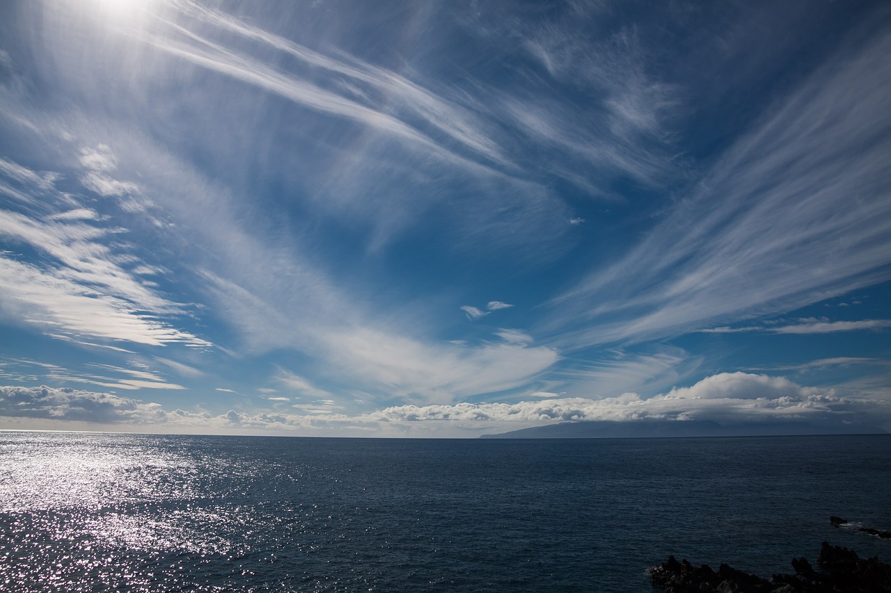 sea sun clouds free photo