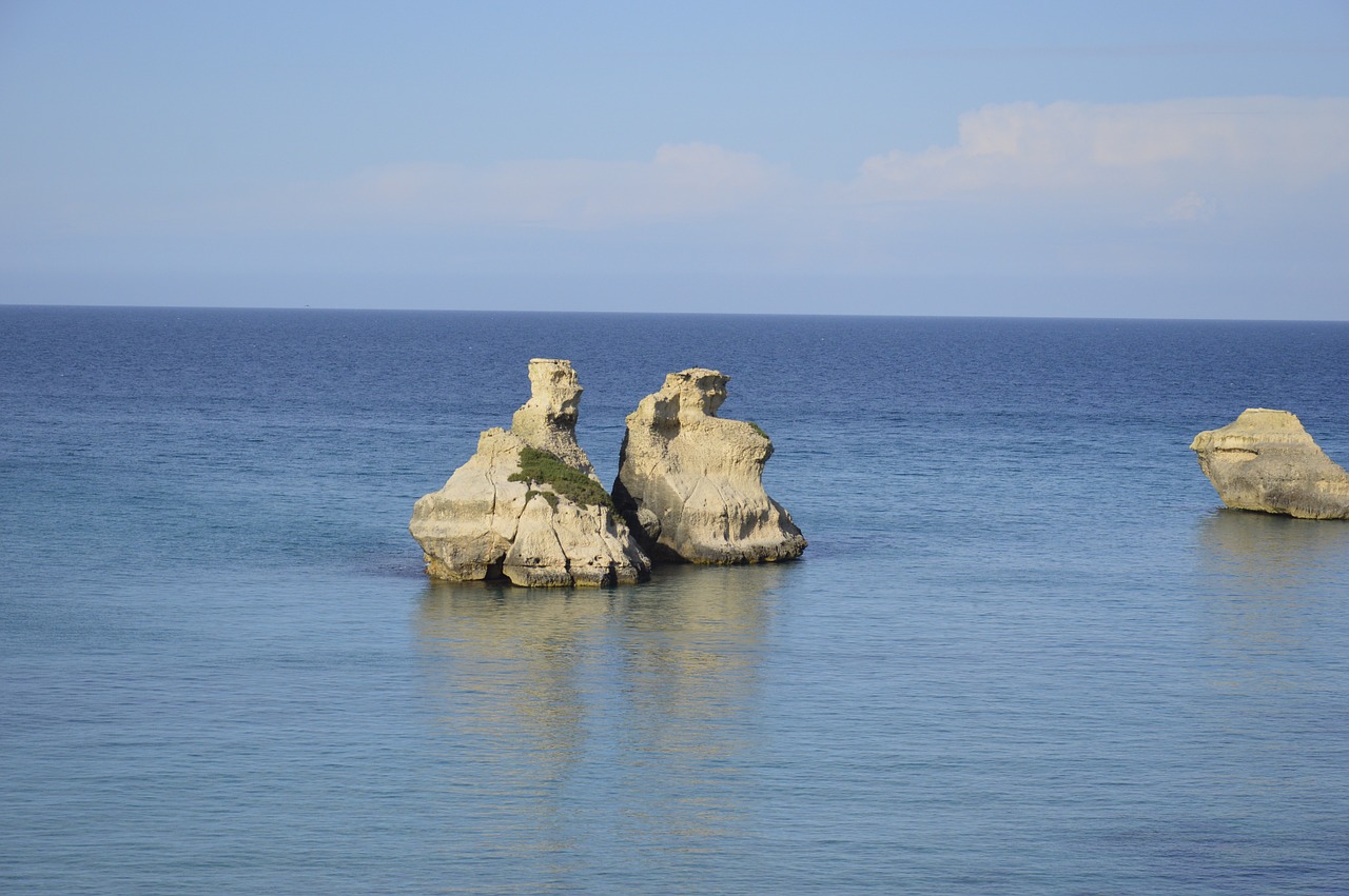 sea two rocks salento free photo