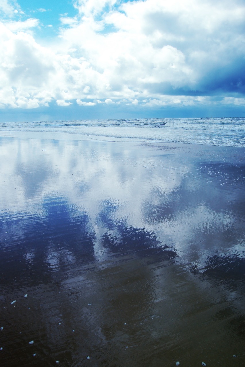 sea clouds beach free photo