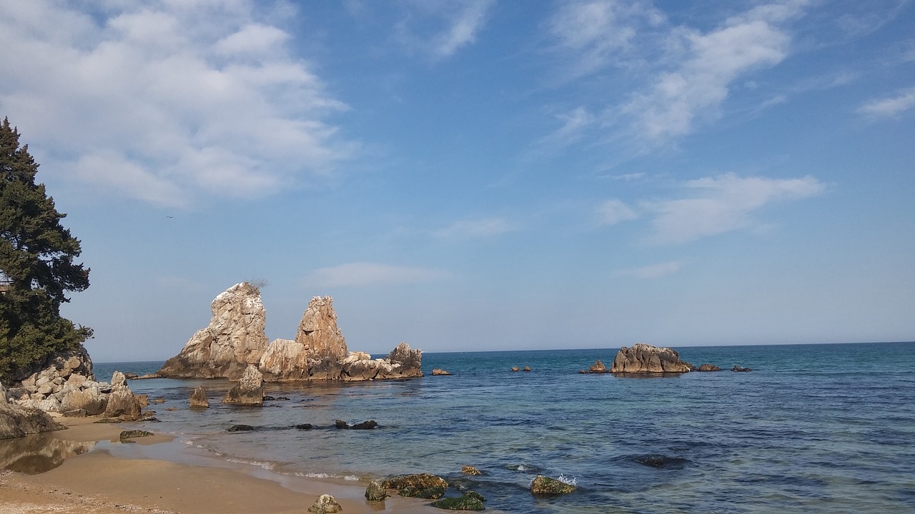 sea rock blue sky free photo