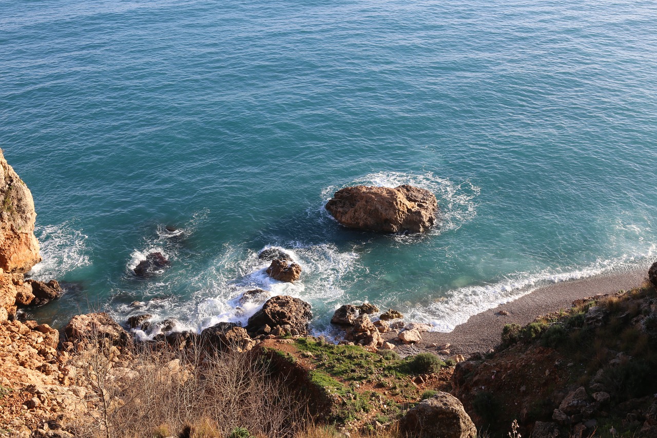 sea rock blue ocean free photo