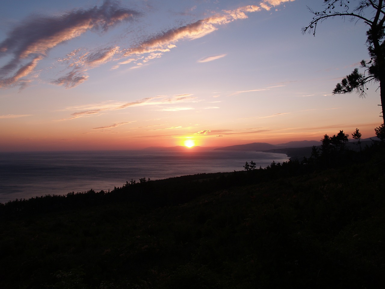 sea mountains sunset free photo