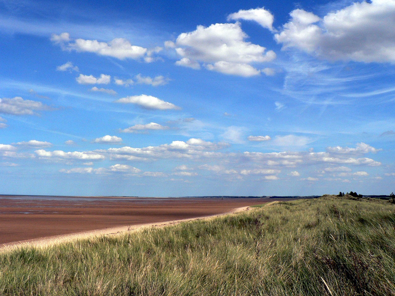 sea strand clouds free photo