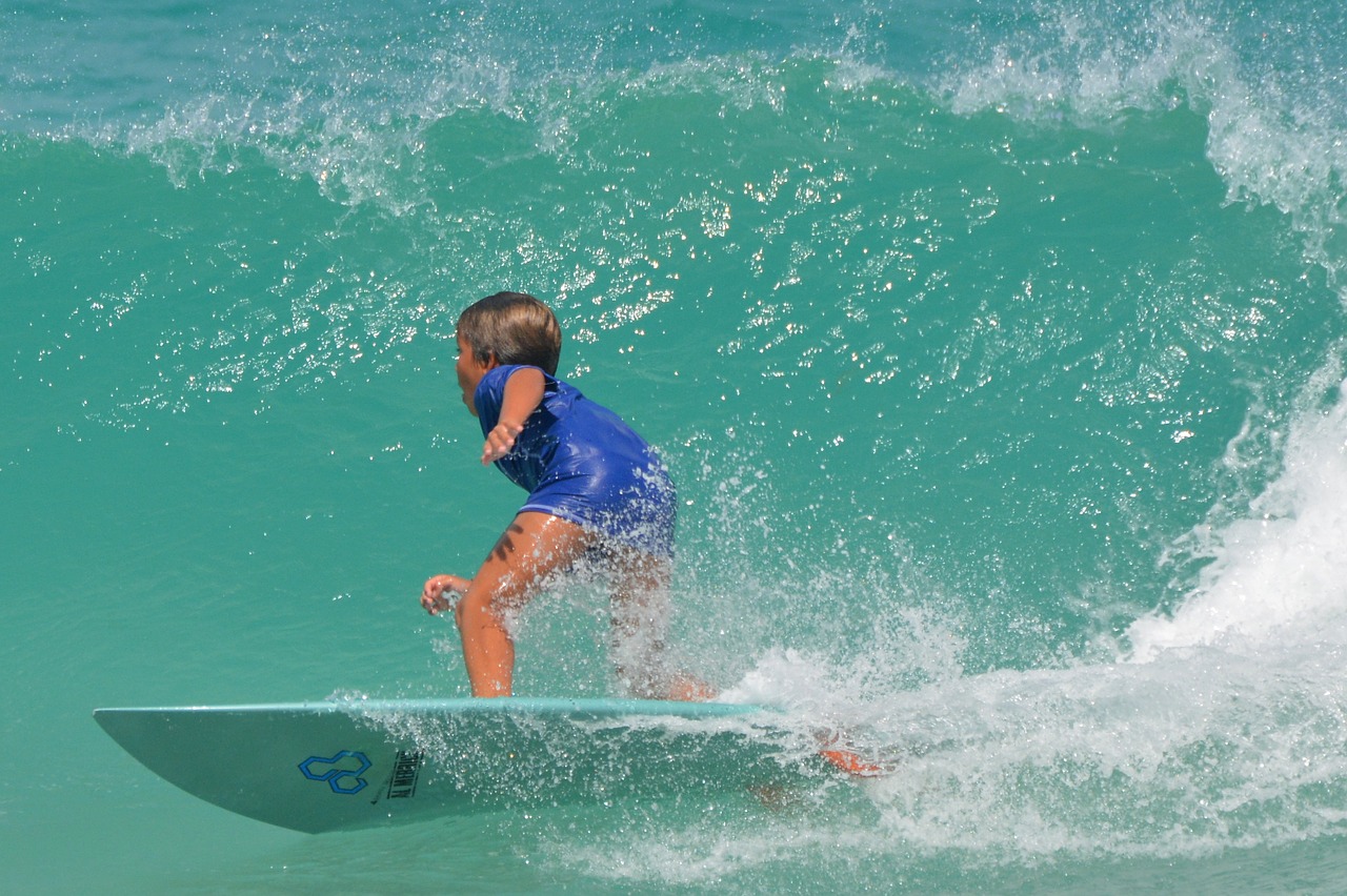 sea,ocean,people,child,surfboard,sports,surf,waves,action,free pictures, free photos, free images, royalty free, free illustrations, public domain