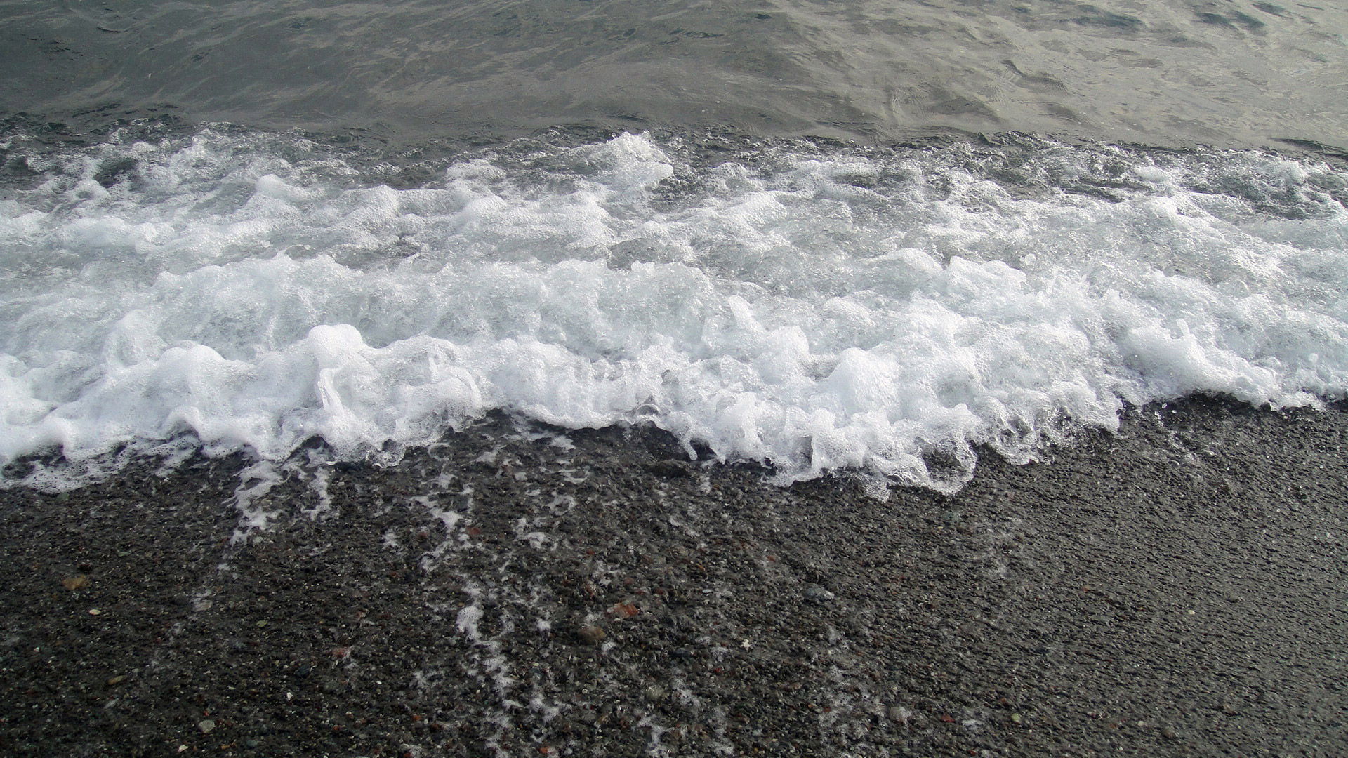 sea breeze black sand sea free photo