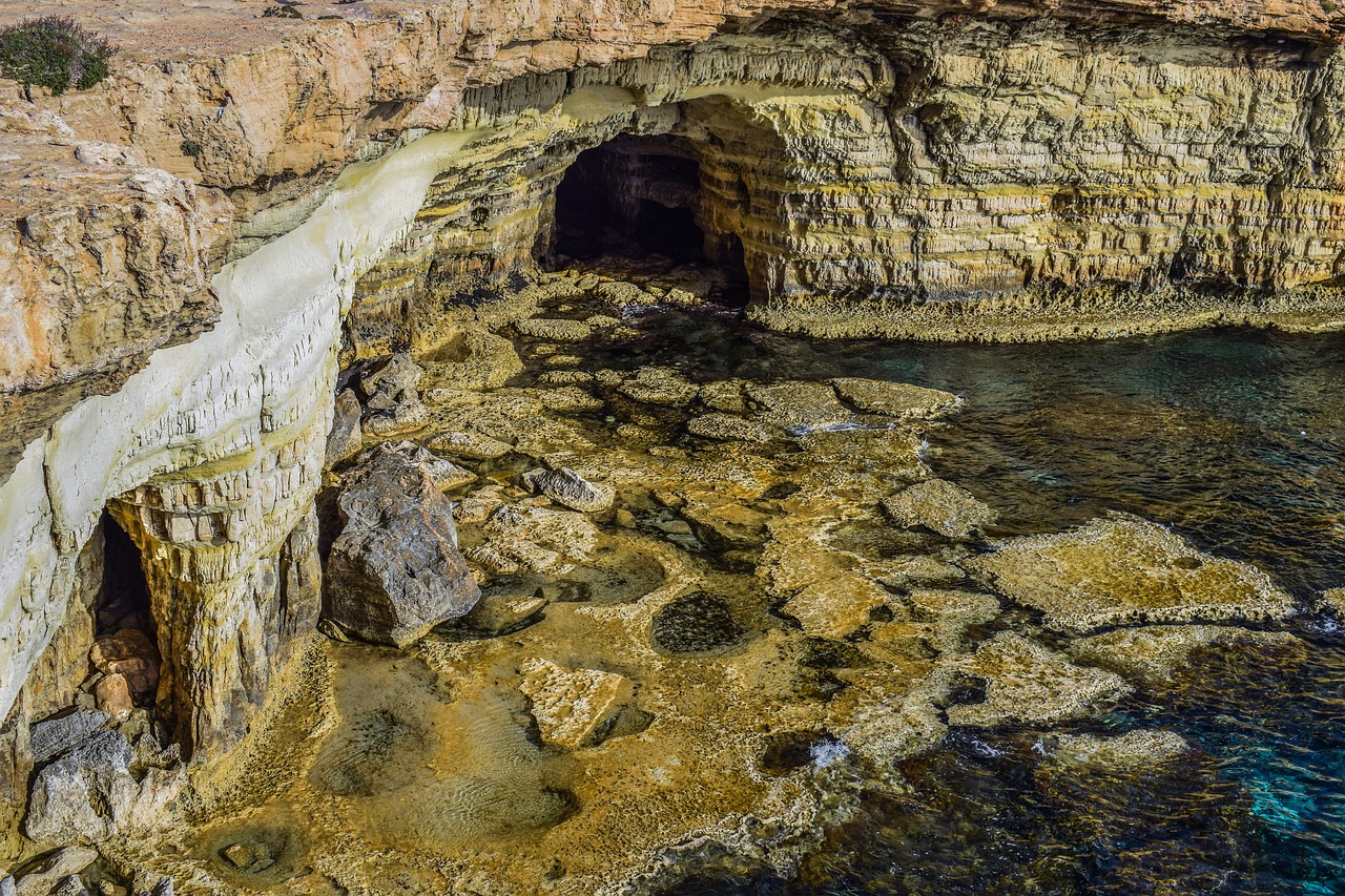 sea cave cliff sea free photo