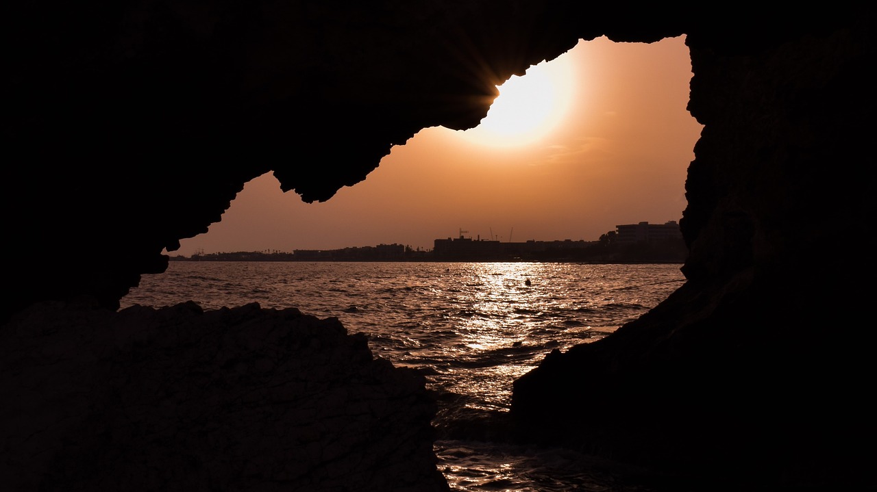 sea cave sunset sun free photo