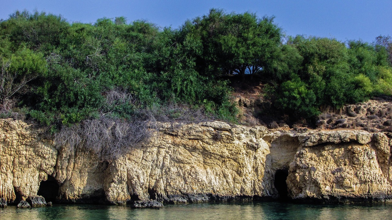 sea caves beach cliff free photo