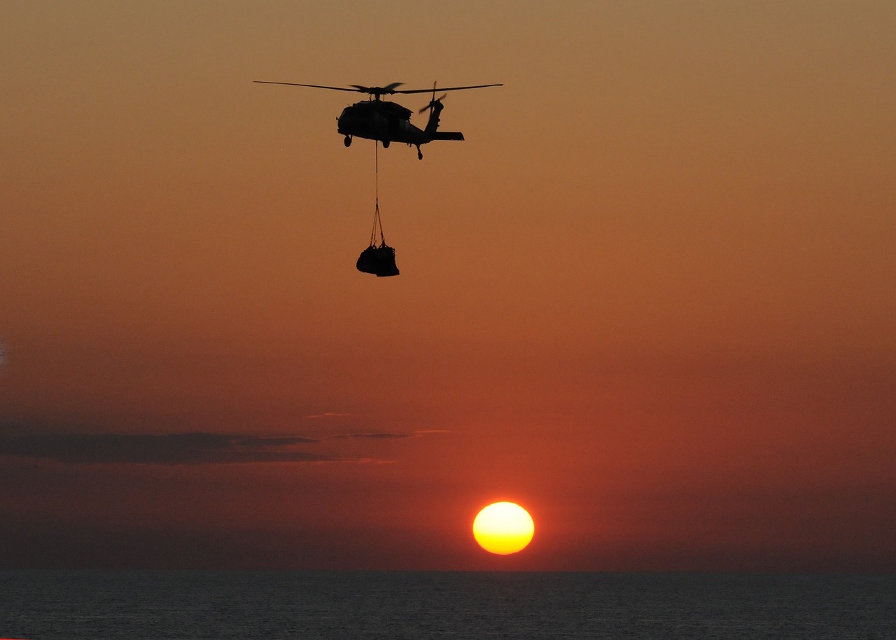 sea hawk helicopter sunset aircraft free photo