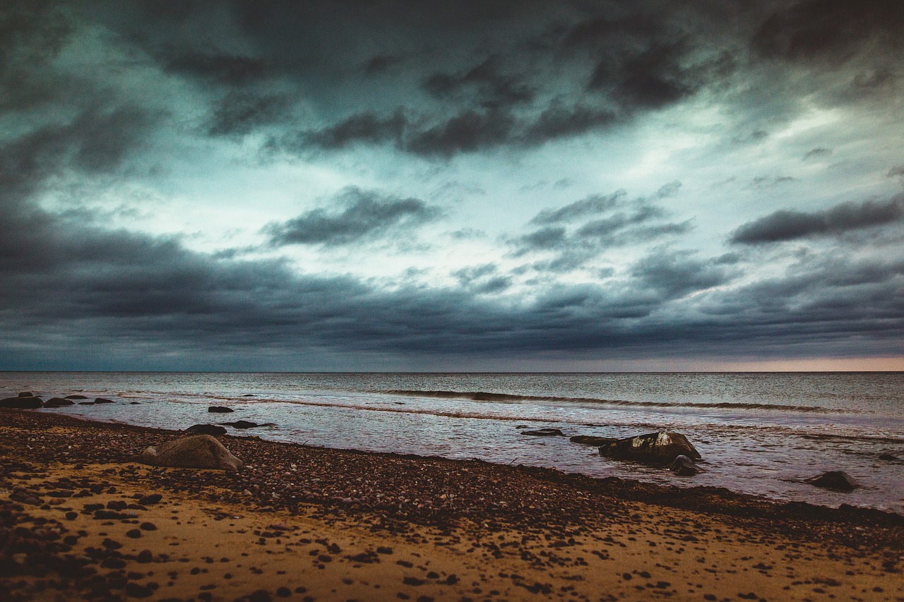 seashore  pebbles  rocks on beach free photo