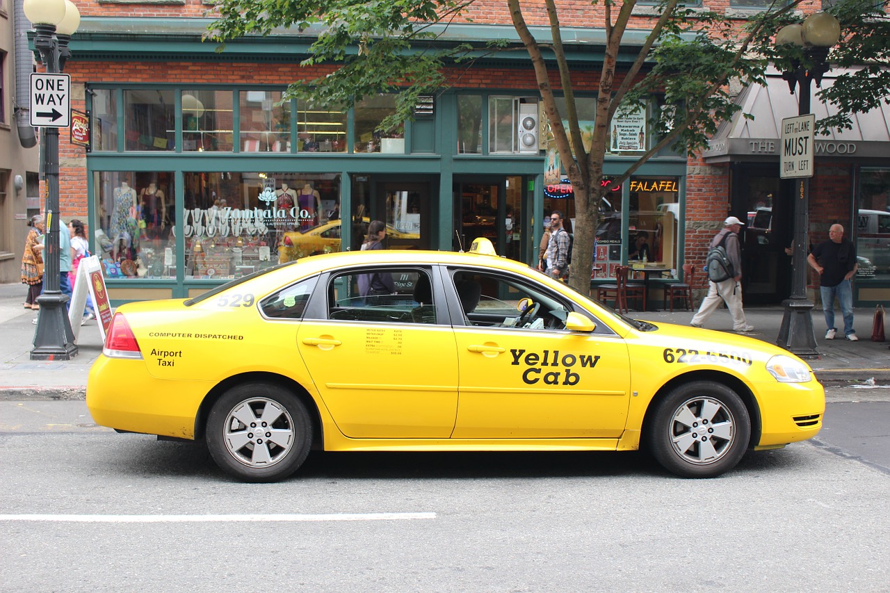 seattle taxis yellow car free photo