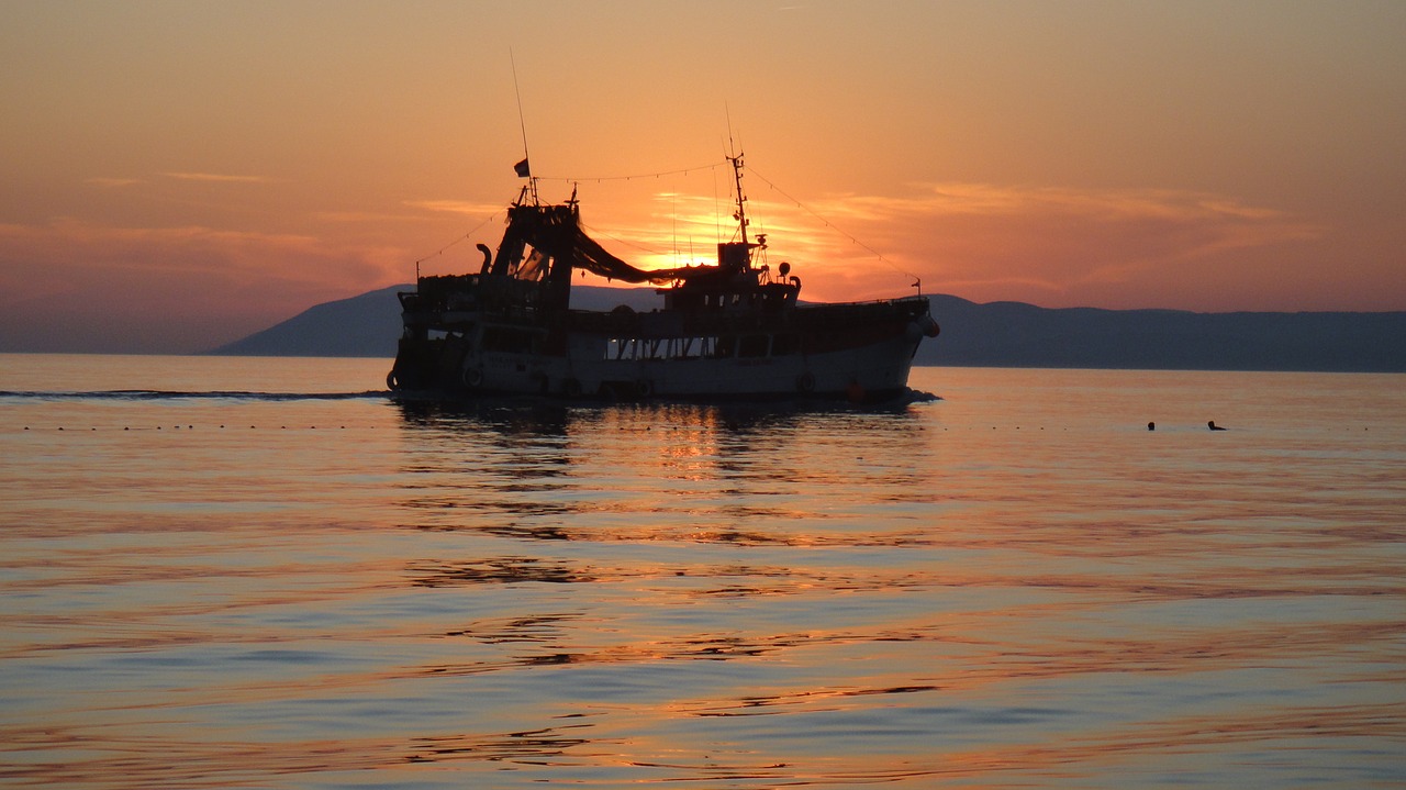 sunset ship ocean free photo