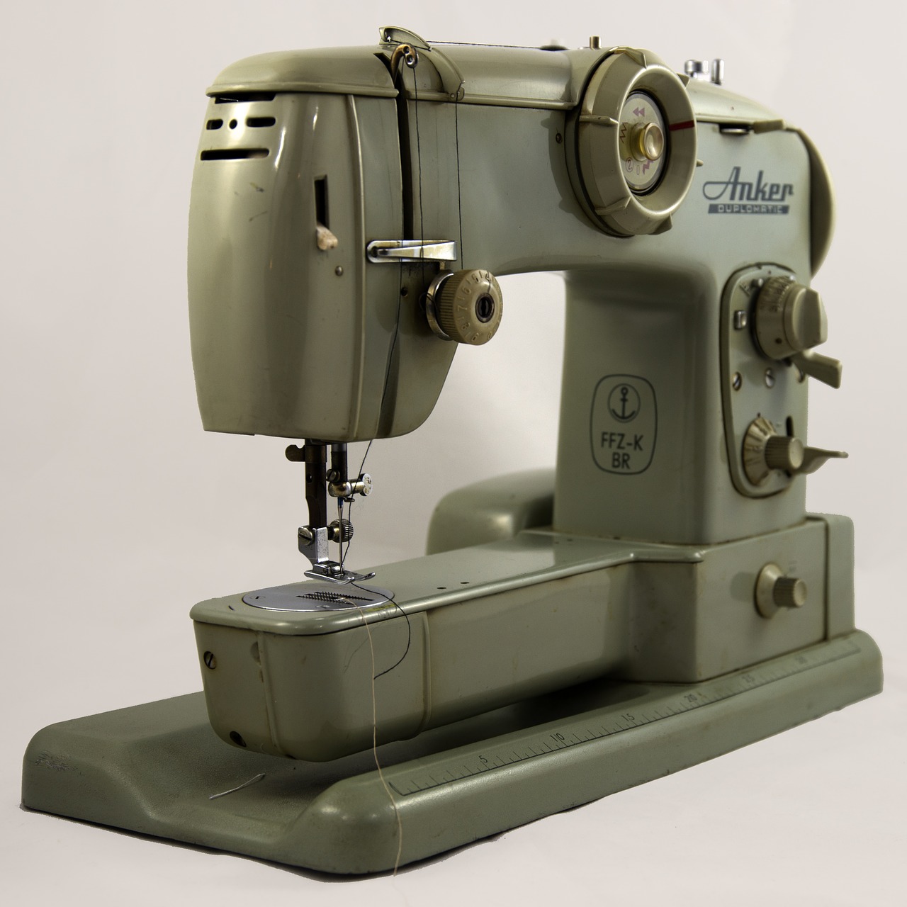 sewing machine anchor hand labor free photo