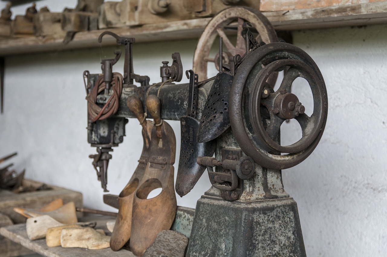 sewing machine  leather  old free photo