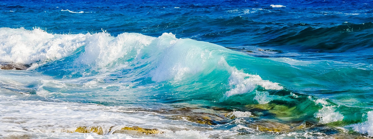 shades of blue wave smashing free photo