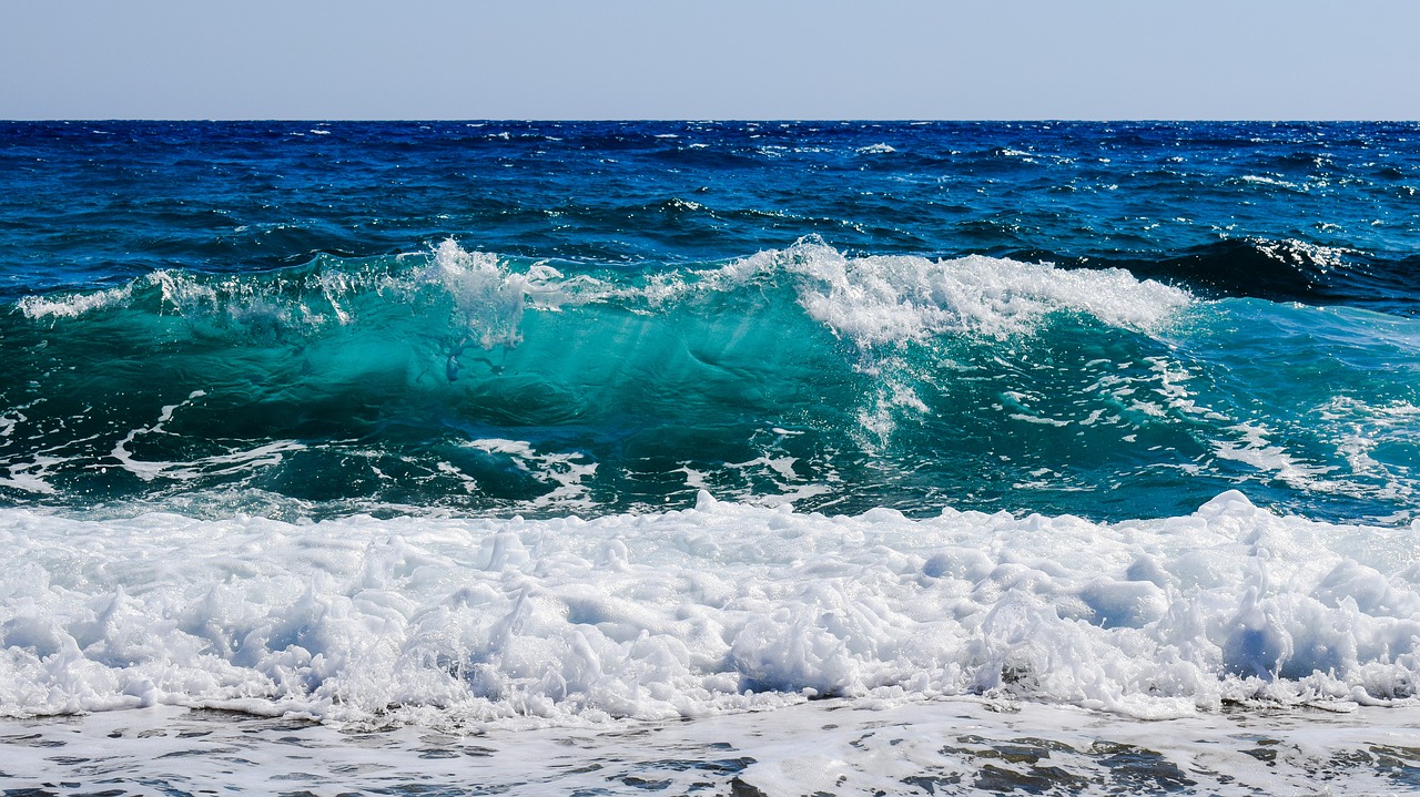 shades of blue wave smashing free photo