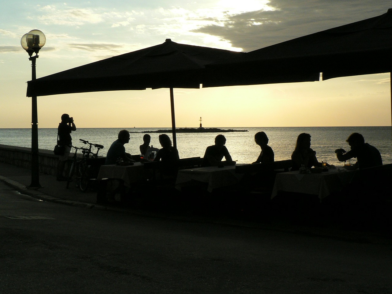 shadow people sea dinner free photo