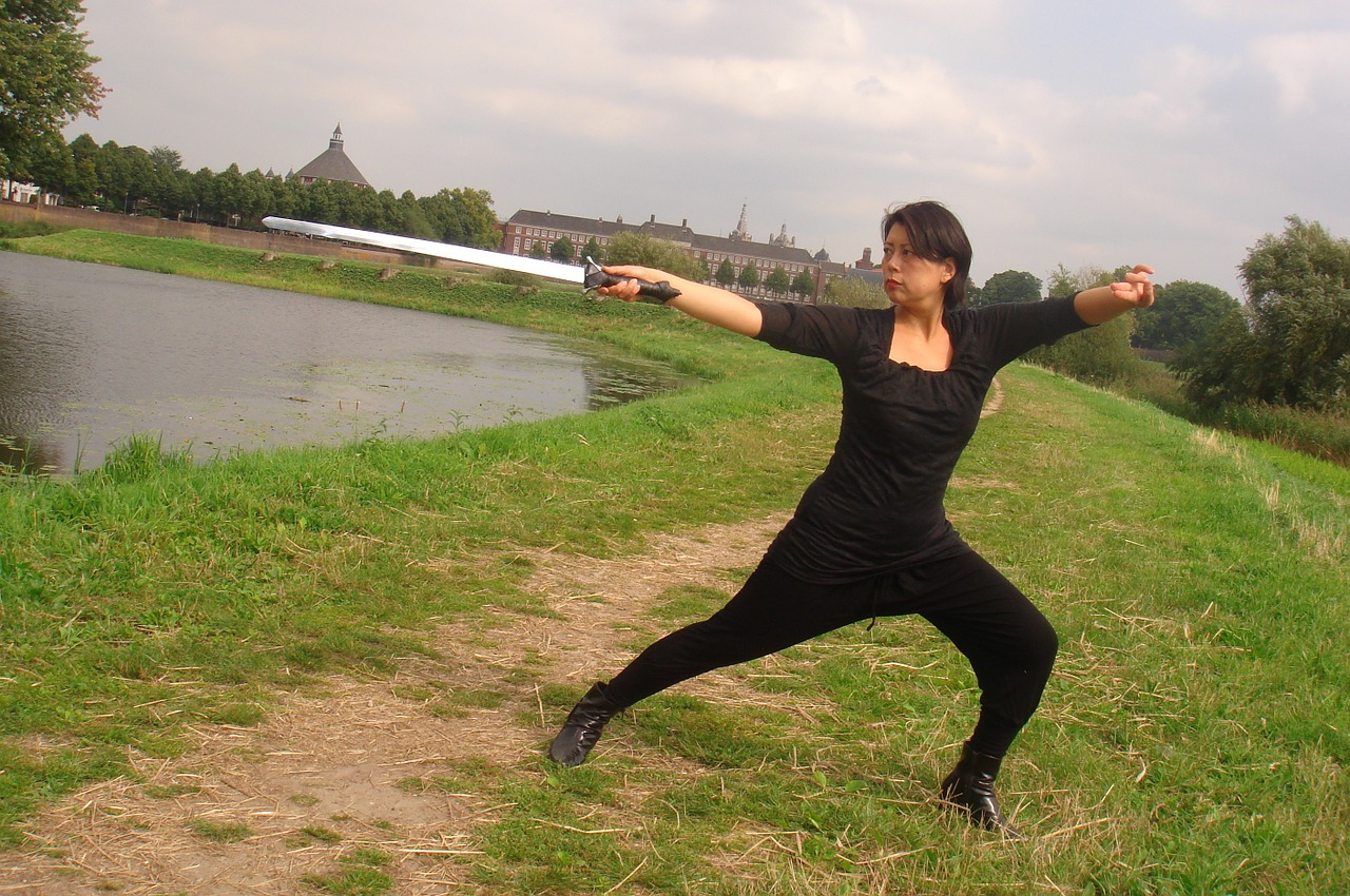 shaolin kung fu swordplay position free photo