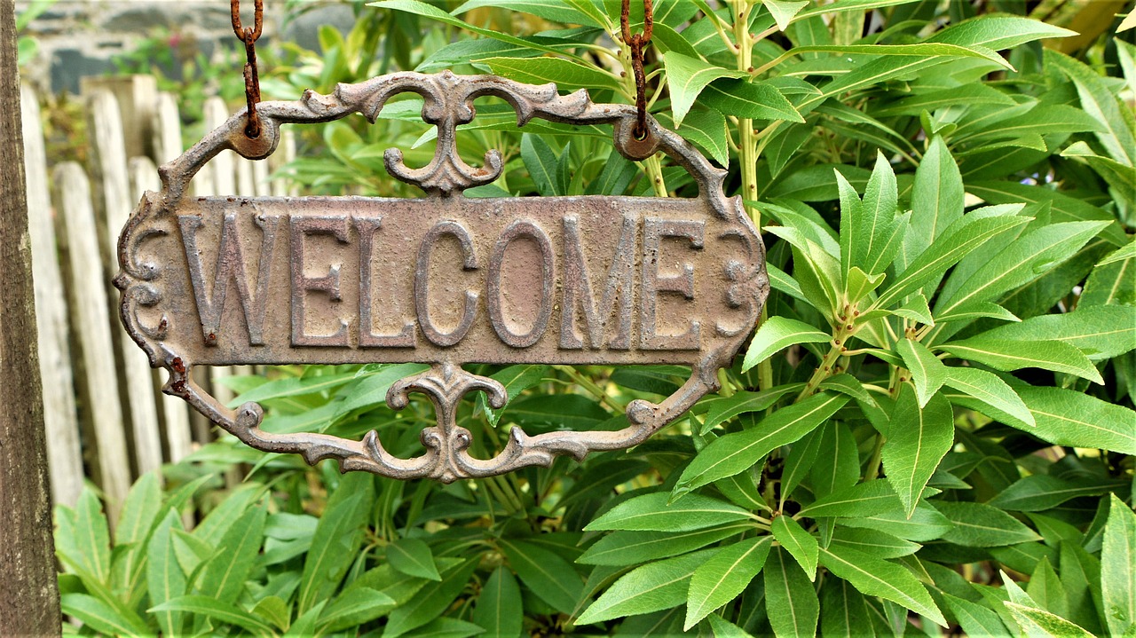 shield metal sign welcome free photo