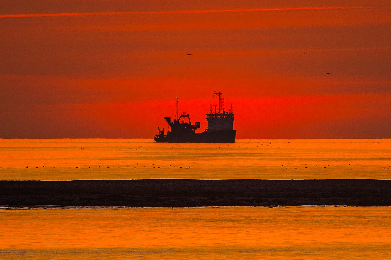 ship sunset sea free photo