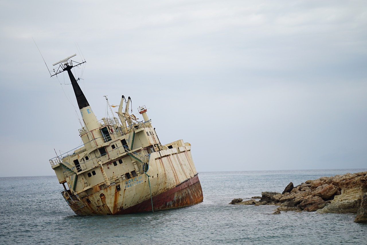 ship wreck  capsizes  boat free photo
