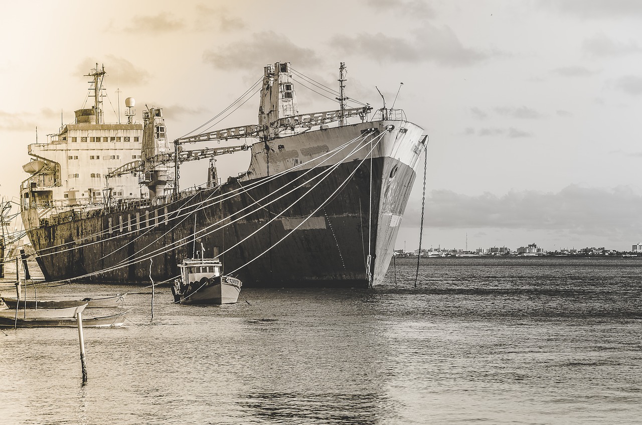 ships black and white moored free photo