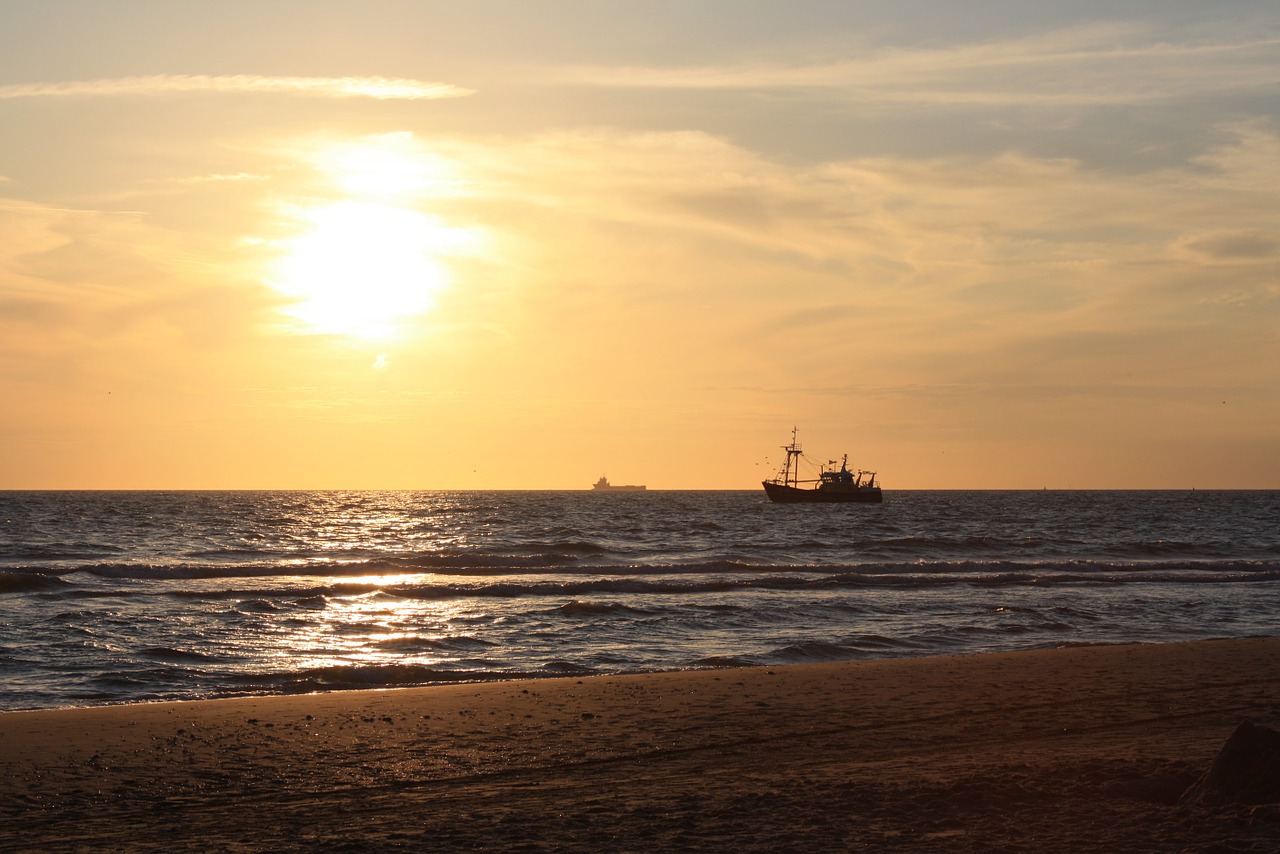 ships sunset north sea free photo