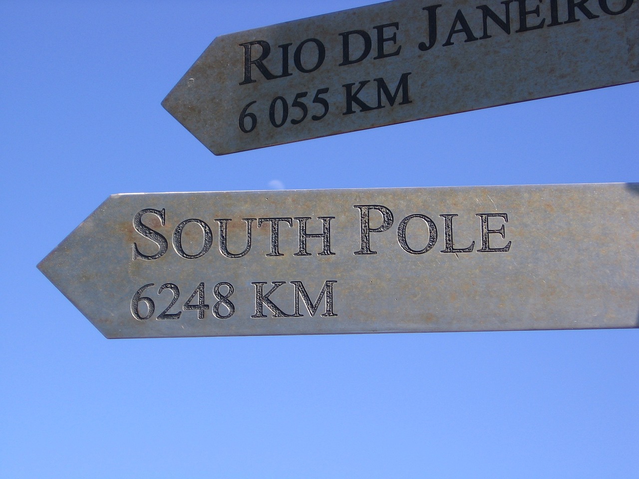 sign south pole pointing free photo