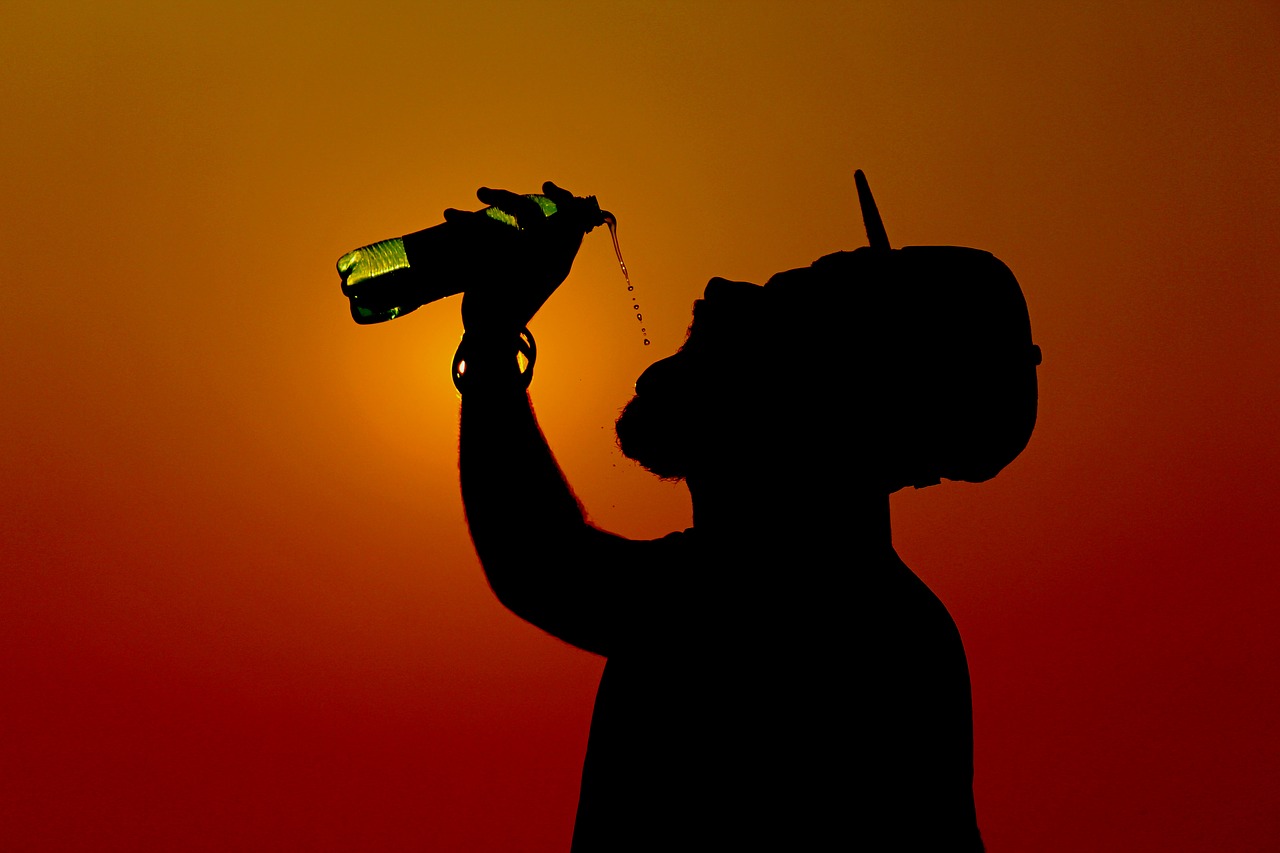 silhouette bottle droplets free photo