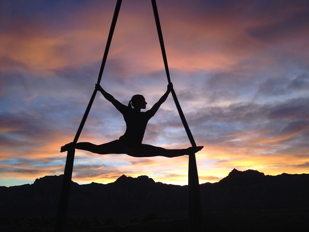 silhouette aerialist female free photo