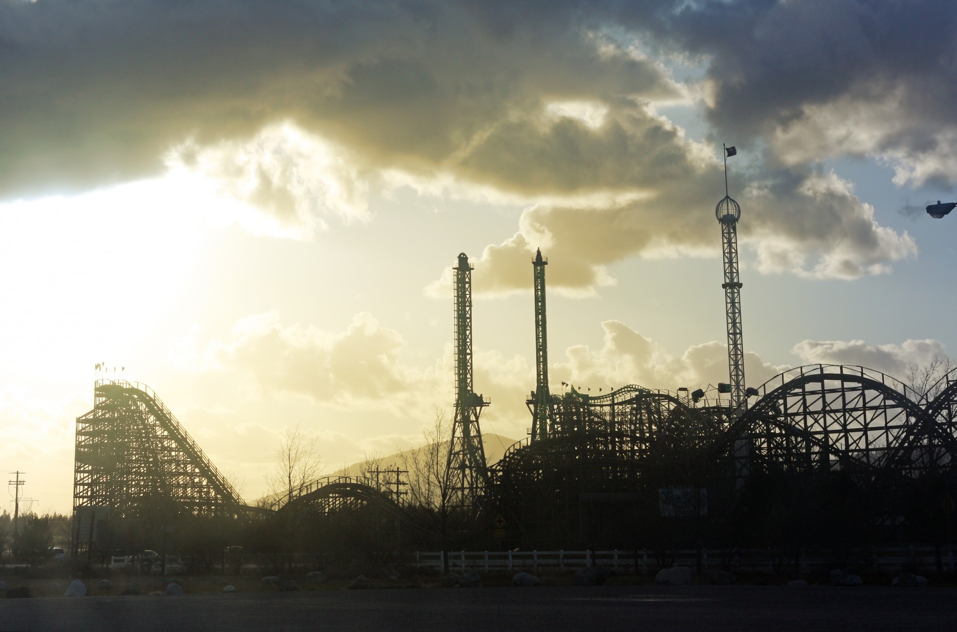 silhouette roller coaster amusement park free photo