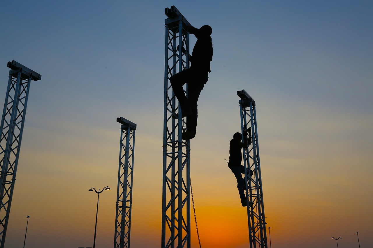 silhouette teamwork  trust  mountain free photo