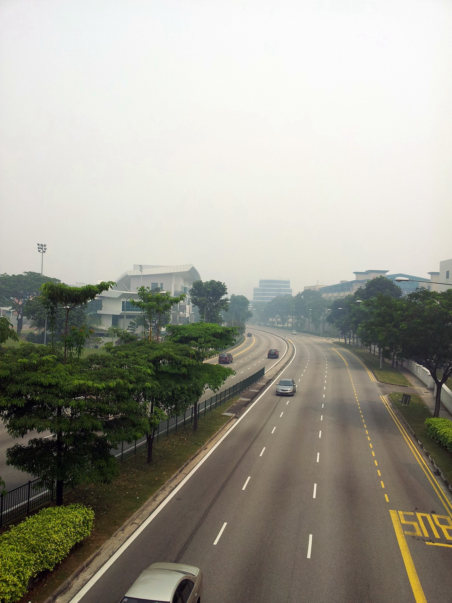 singapore hazy sky road smog smoke free photo