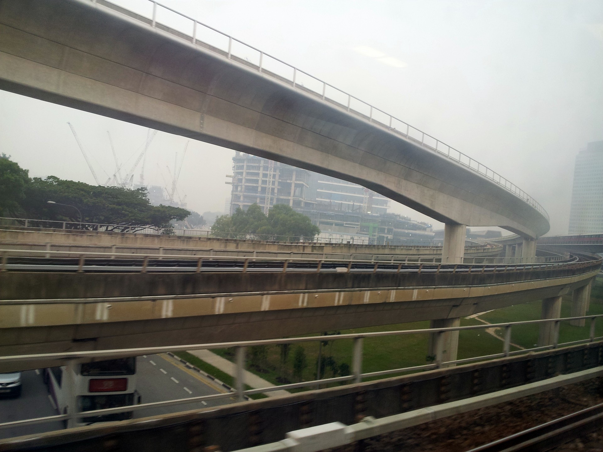 singapore jurong east mrt bridges haze public transportation rail free photo