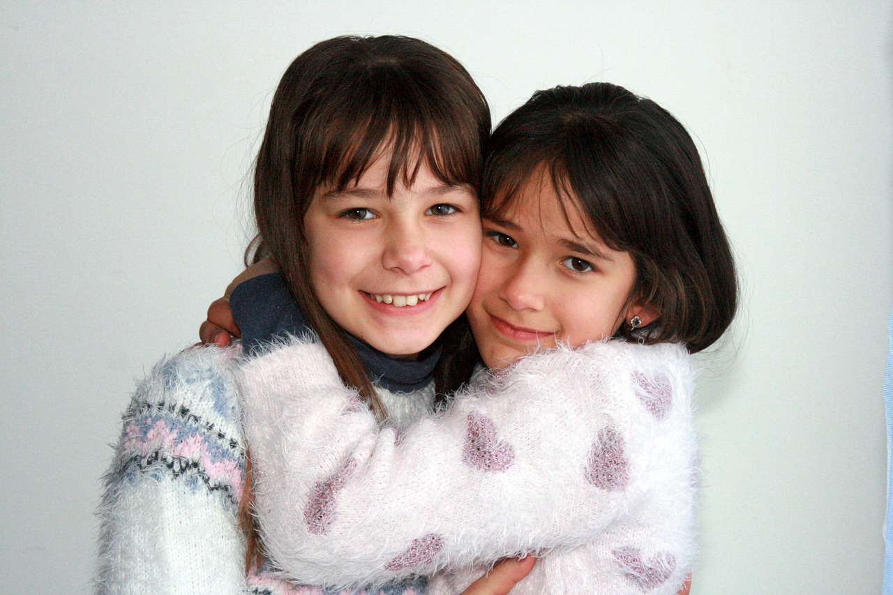 sisters love hug free photo