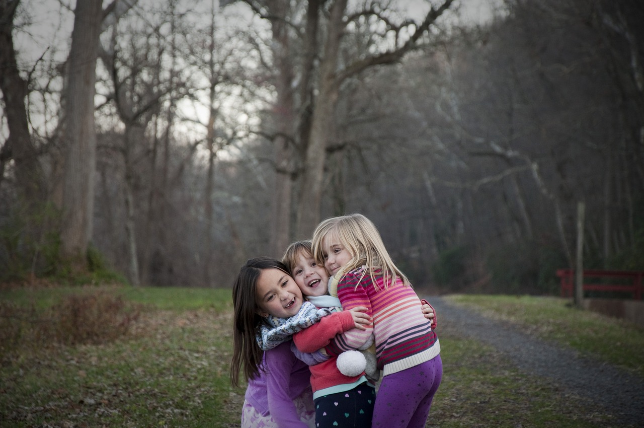 sisters fun hugging free photo