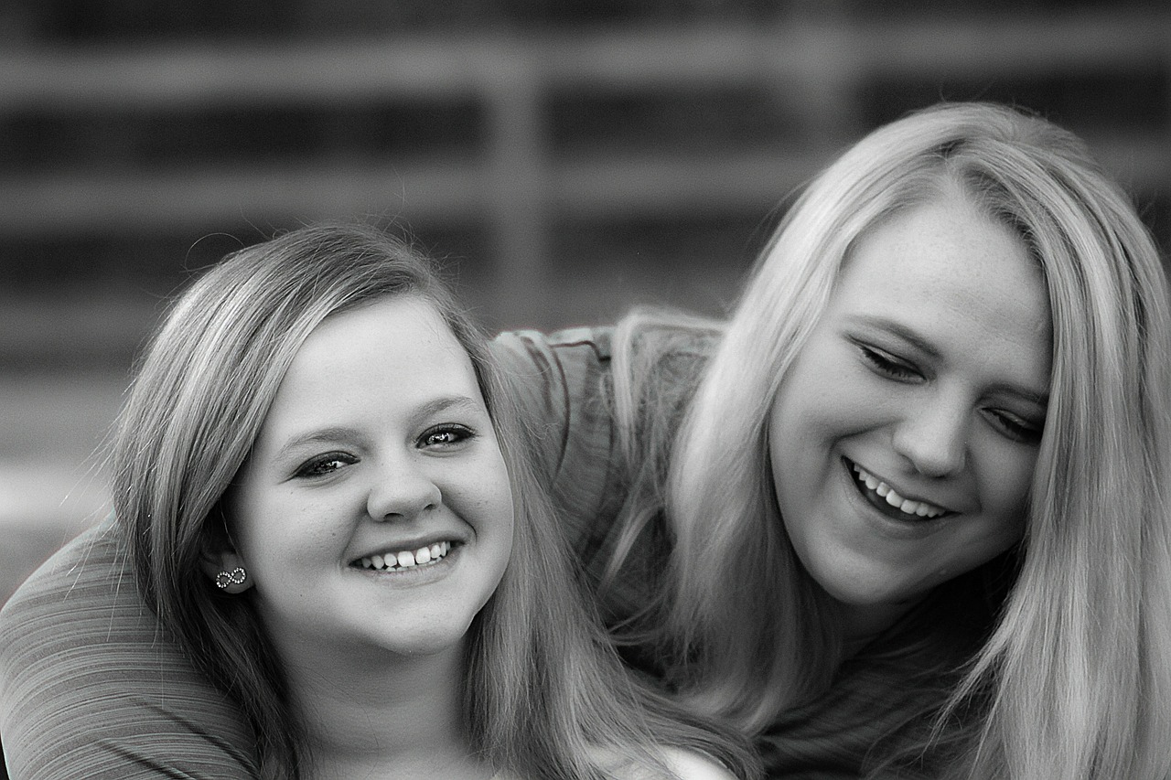 sisters laughing love free photo