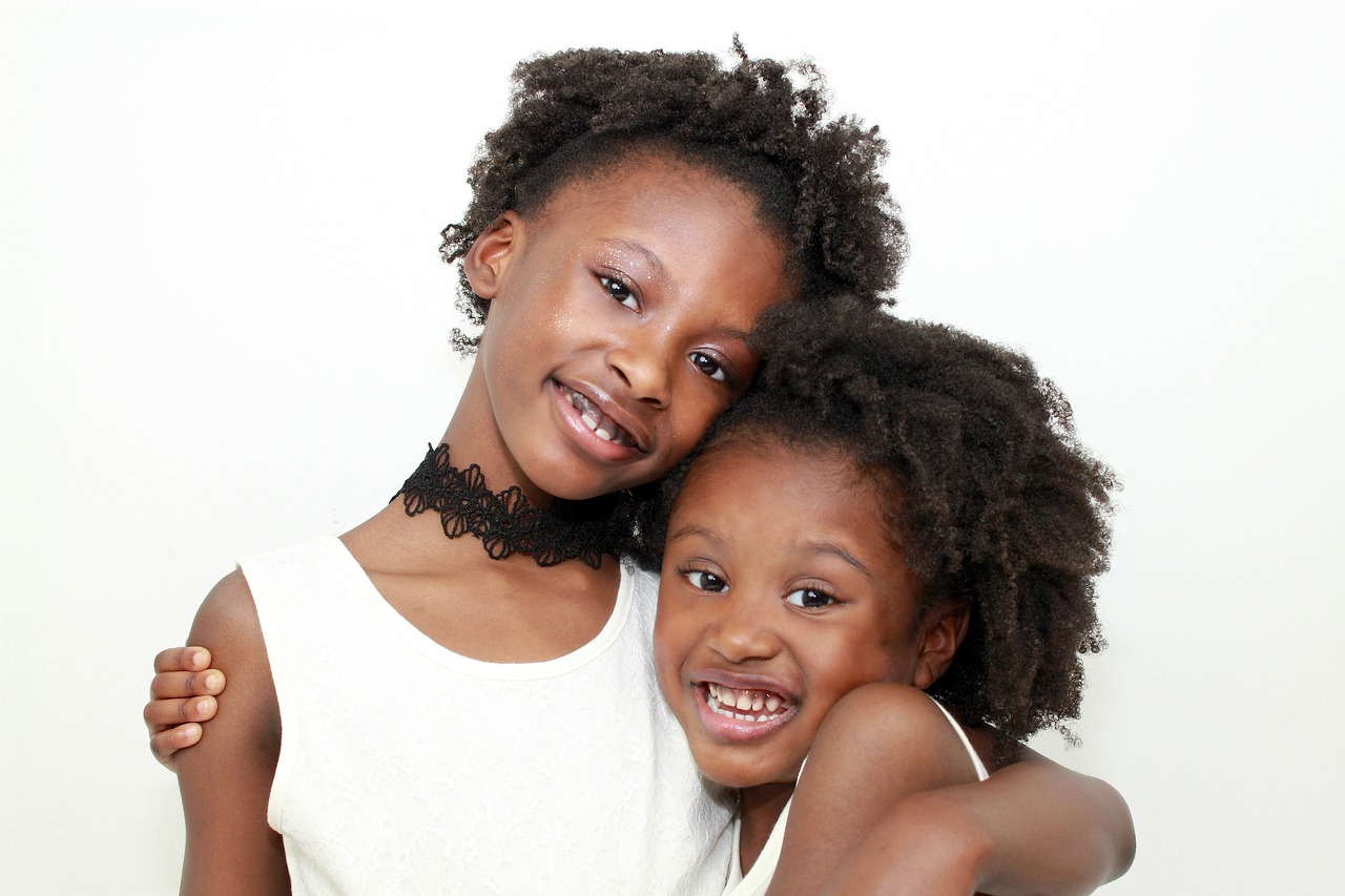 sisters  black hair  hair care free photo